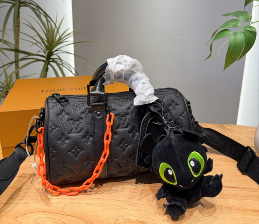 Embossed Monogram Leather Keepall 25